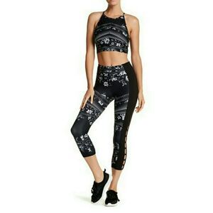 NWT Betsy Johnson floral cutout leggings. XS